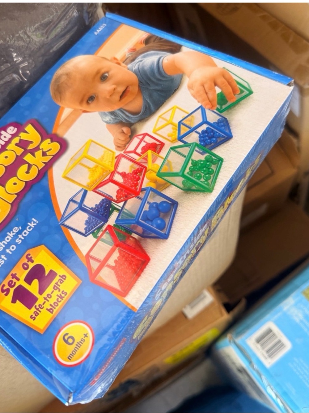 Colorful Baby Sensory Shake & Stack Blocks - Red, Yellow, Blue, Green